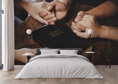 Group of different women praying together Wall mural