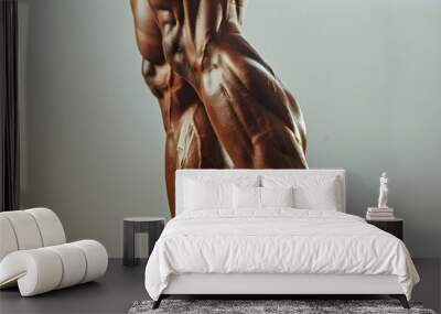 Closeup image of defined calf muscles on a person's leg, showcasing muscle definition and strength. Wall mural