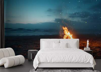 Friends gather around a beach bonfire, roasting marshmallows and celebrating with sparklers and smiles. Wall mural