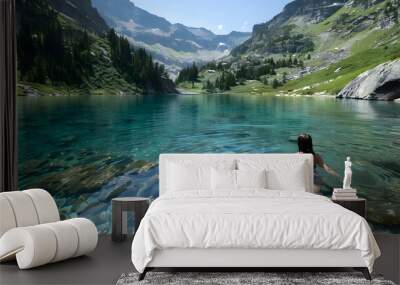 Serenity found swimming in crystal clear mountain lake, surrounded by breathtaking natural beauty. Wall mural