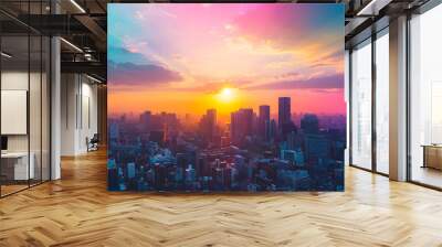 Vibrant rainbow colors illuminate the city skyline at sunset in a stunning and colorful display. Wall mural