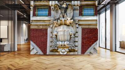 The coat of arms of the Ellis Island Immigration Museum, which was the U.S. Customs House in New York which was the gateway for millions of immigrants Wall mural