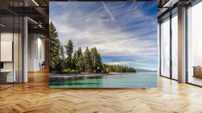 USA, California, El Dorado County, D.L. Bliss State Park. The shoreline and green waters of Lake Tahoe on a day with whispy clouds. Wall mural