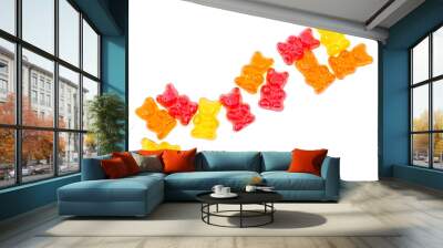 Colorful eat gummy bears isolated on a white background, top view. Wall mural