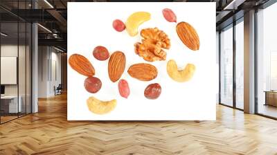 Mix of different nuts isolated on a white background Wall mural