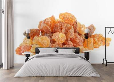 Pile of natural Commiphora myrrha isolated on a white background. Myrrh resin. Sweet Myrrh Opoponax. Incense. Wall mural