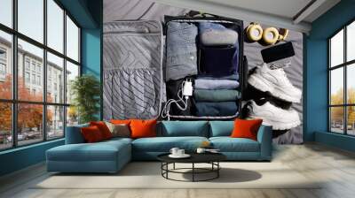 top view of suitcase withcamera and headphones Wall mural