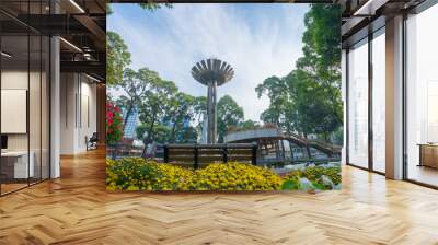 Wide angle view of Lotus pillar - An iconic architecture at Turtle lake (Ho Con Rua) with blue sky in Saigon. Wall mural