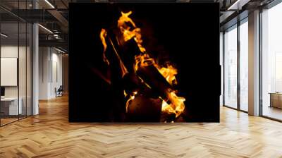 Flame of fire with sparks on a black background Wall mural