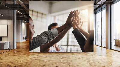 Fitness, teamwork and high five of people in gym for motivation, support and target. Workout, exercise and training with hands of friends in sports center for team building, challenge and achievement Wall mural