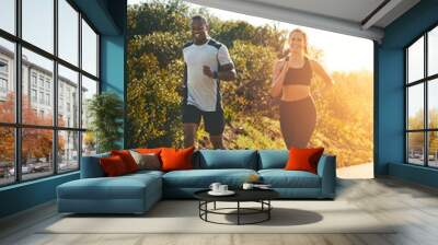 Freedom, running and happy with couple in road for workout, cardio performance and summer. Marathon, exercise and teamwork with black man and woman runner in nature for sports, training and race Wall mural