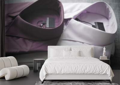 Purple folded mens cotton shirt Wall mural