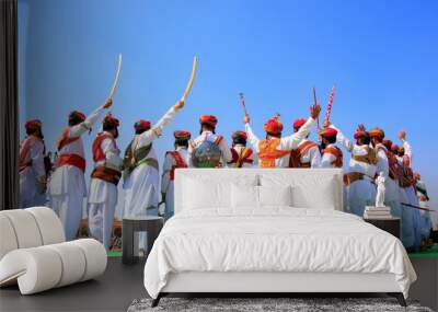 Indian men in traditional dress taking part in Mr Desert competi Wall mural