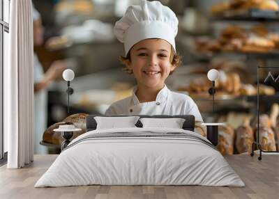 Proud Young Chef Holding Tray of Freshly Baked Bread in Commercial Kitchen Wall mural