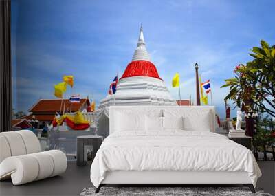 White pagoda against blue sky at Wat Poramaiyikawas Temple in No Wall mural