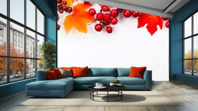 Autumn leaves and autumn fruits on white background with copy space Wall mural