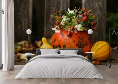 Hollow pumpkin with floral decoration Wall mural