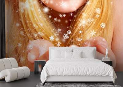 beautiful blonde woman blowing snow Wall mural