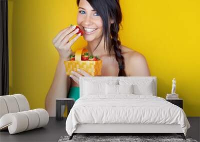 smiling girl with red fresh strawberries Wall mural