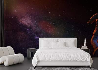 astronaut flying towards the beautiful Milky Way galaxy Wall mural