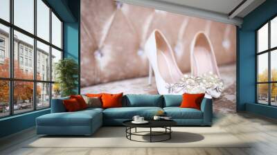 Elegant and stylish bridal shoes. Selective focus. Wall mural