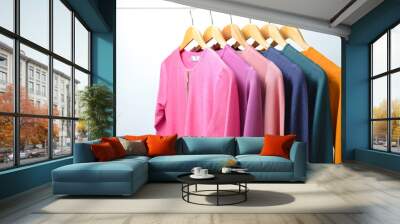 Fashion clothes on clothing rack - bright colorful closet. Summer home wardrobe. Wall mural