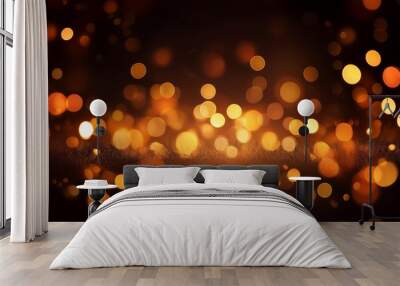 A dark background with many orange and yellow bokeh lights Wall mural