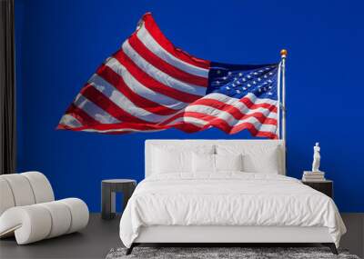 American flag waving in clear blue sky Wall mural