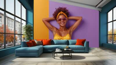 Cute sexy woman in swimsuit and sunglasses isolated on purple background. Travel, vacation, tourism concept. Wall mural