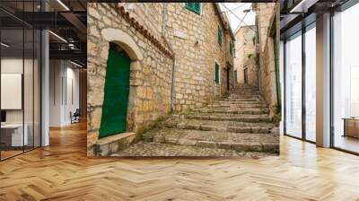 A residential street in the historic coastal village of Sutivan, Brac Island, Croatia Wall mural