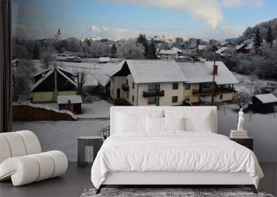 The snowy December landscape in Gorenjska, Slovenia. Vincarje village is in the foreground, and Skofja Loka in the background
 Wall mural