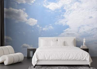 Background of light blue sky and beautifully patterned clouds Wall mural