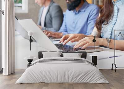 Business people working on laptops Wall mural