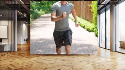 Young jogger Wall mural