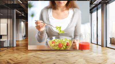 Woman dieting and eating a salad Wall mural