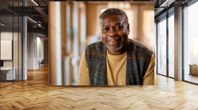 Happy African American senior at nursing home looking at camera. Wall mural