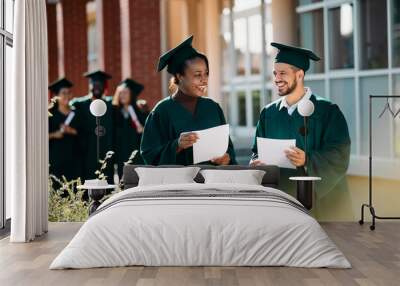 Happy multiracial university friends with graduation diplomas at campus. Wall mural