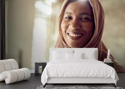 Portrait of happy black Islamic businesswoman in her office. Wall mural