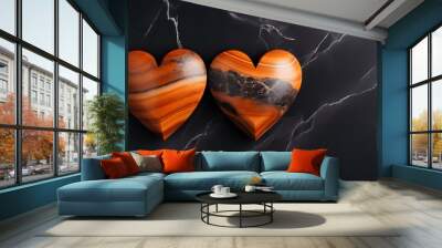 Close up of two orange Hearts on a black Marble Background. Romantic Backdrop with Copy Space Wall mural