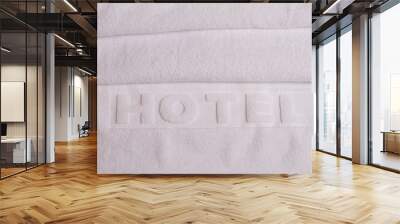 Stack of white  hotel towels. Perfect white laundry. Keep Whites White. Hotel hygiene Wall mural