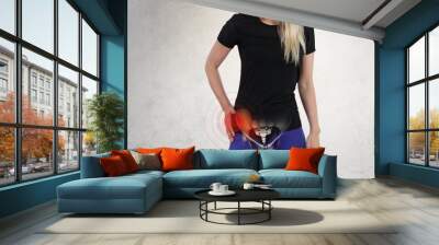 Woman with hip joint pain. Sport exercising injury Wall mural