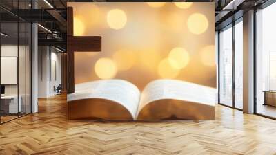 A wooden cross symbol, an open book with pages illuminated by warm bokeh lights, religious faith concept, soft ethereal glow, spiritual atmosphere Wall mural