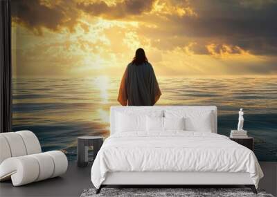 Christ Walking on Water at Sunset – A Stunning Photo Capturing a Miraculous Defiance of Gravity. This Peaceful and Inspirational Image Features a Tranquil Ocean Scene, Rich in Religious Symbolism. Wall mural