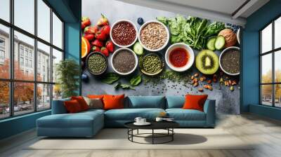 Healthy food clean eating selection fruit, vegetable, seeds, superfood, cereal, leaf vegetable on gray concrete background Wall mural