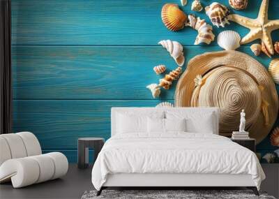 Rustic blue wooden background with a wide variety of seashells scattered around, including scallops, starfish, conch shells, clam shells, seaside travel hat, summer beach vacation concept, vivid color Wall mural