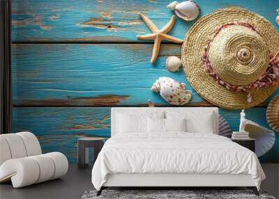 Seashells, starfish, summer hat on blue weathered wooden background, beach holiday concept, vibrant colors, seascape, tropical vacation, summer vibe Wall mural