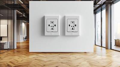 A clean and simple image of two white electrical outlets set against a pristine white background, perfect for discussions on electrical safety and home installations. Wall mural