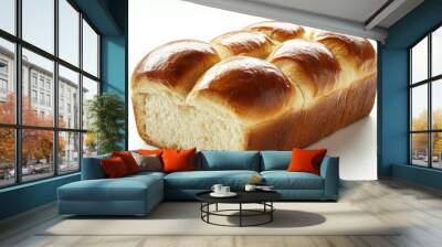 A loaf of sweet brioche bread with a soft, buttery texture, isolated on a clean white background Wall mural