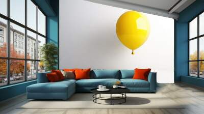 A bright yellow balloon floating freely against a white background, bringing a sense of happiness and simplicity Wall mural