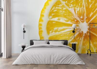 A close-up of a lemon slice with zesty yellow peel and juicy interior, set on a bright white background Wall mural